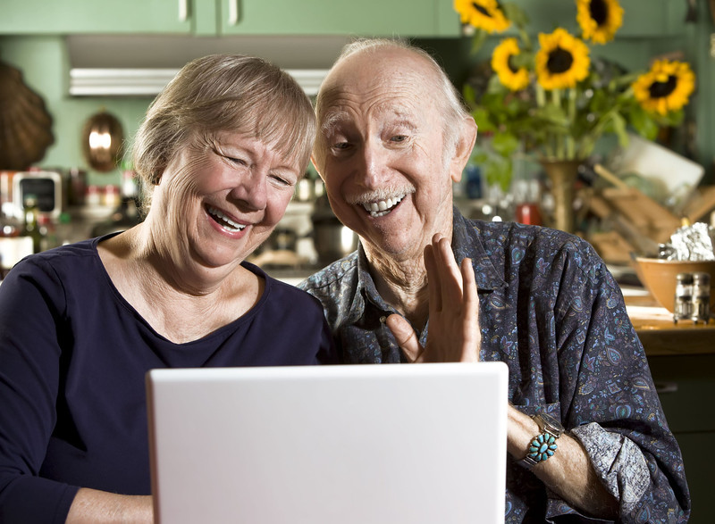 Grandparents using skype to talk with Grandchildren