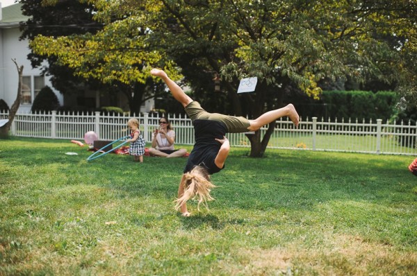 one-handed cartwheel girl