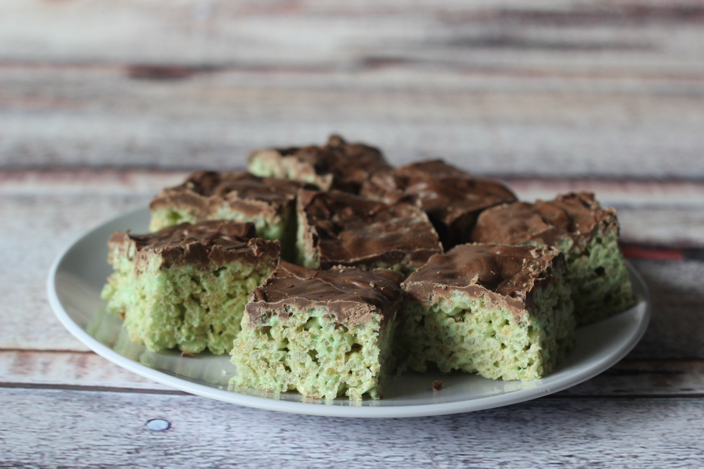 Mint Chocolate rice krispie treats may just be the perfect treat for St. Patrick's Day, but I'm not limiting this delicious and easy no-bake dessert to one week a year. You'll love this quick and easy recipe so much you'll want to make it all the time!