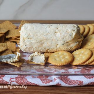 The best cheese log recipe for the holidays and beyond. This is a family favorite holiday appetizer, along with crackers. We have it at each holiday gathering!