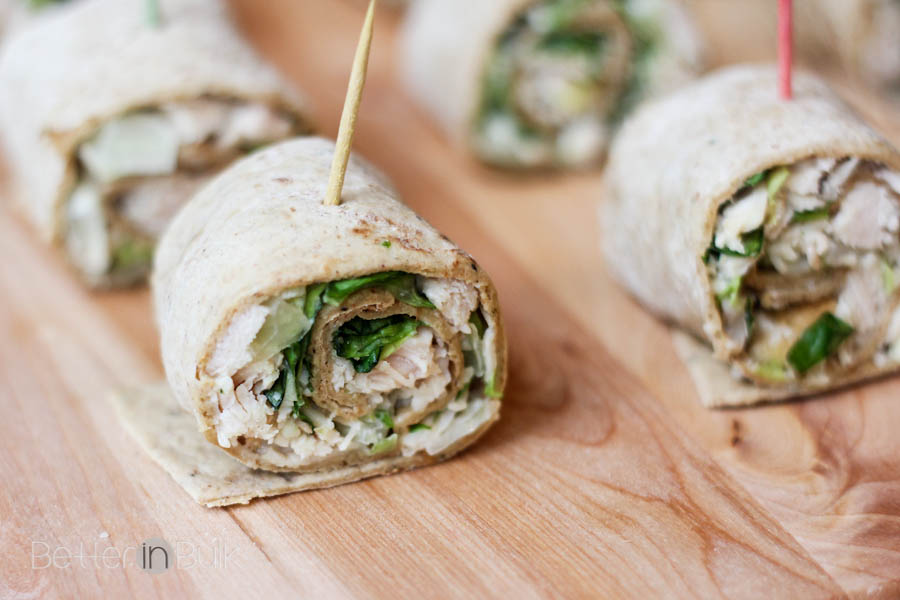 These may just be the perfect way to eat salad...on a toothpick! Easy Chicken Caesar Salad Pinwheels recipe - a family-friendly quick meal or party appetizer