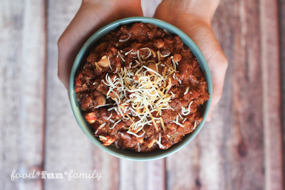 The Best Crockpot Chili Recipe - This is the BEST kind of comfort food and so easy to make! Just throw everything in your slow cooker and enjoy a delicious, easy dinner at night