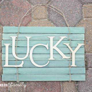 Looking for a cute St. Patrick's Day craft? This DIY project came as a result of a search for a paint stick crafts. The result is a fun and festive St. Patrick's Day Lucky rustic wall hanging.