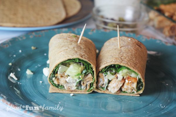 A delicious lunch or dinner in just 15 minutes! Greek-Style Chicken Wraps with Tyson® Grilled & Ready Chicken Breast Strips from Food Fun Family.