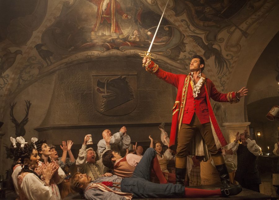 Gaston (Luke Evans) a handsome but arrogant brute, holds court in the village tavern in Disney's BEAUTY AND THE BEAST, directed by Bill Condon, a live-action adaptation of the studio's animated classic and a celebration of one of the most beloved stories ever told.