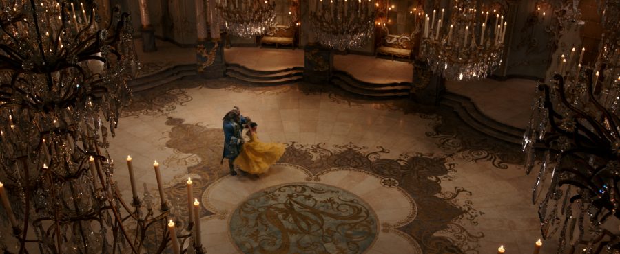 Belle (Emma Watson) comes to realize that underneath the hideous exterior of the Beast (Dan Stevens) there is the kind heart of a Prince in Disney's BEAUTY AND THE BEAST, a live-action adaptation of the studio's animated classic directed by Bill Condon.