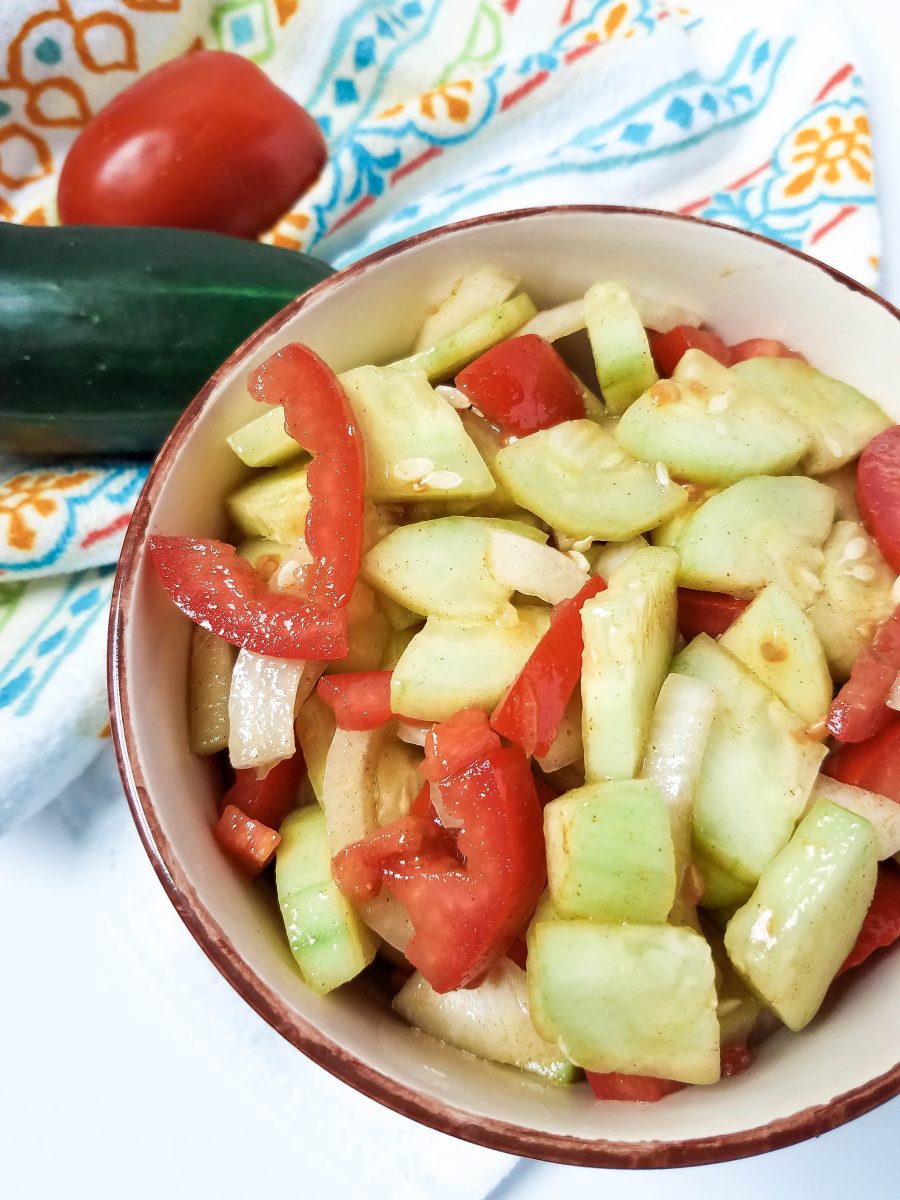 Cucumber tomato salad with vinaigrette dressing