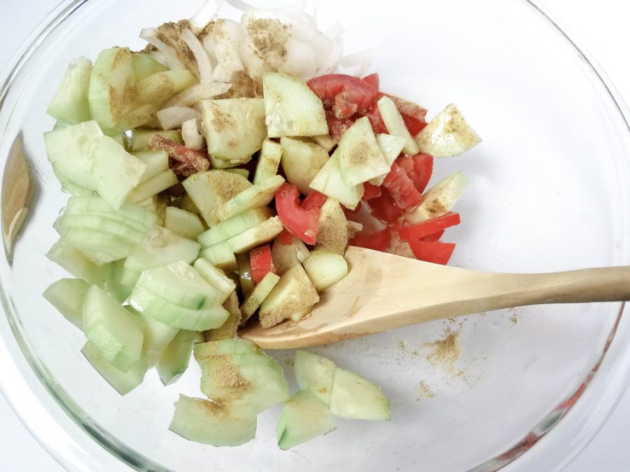 Cucumber tomato salad with vinaigrette dressing